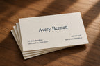 Stack of personalized Classic Standard business cards showing woven linen texture